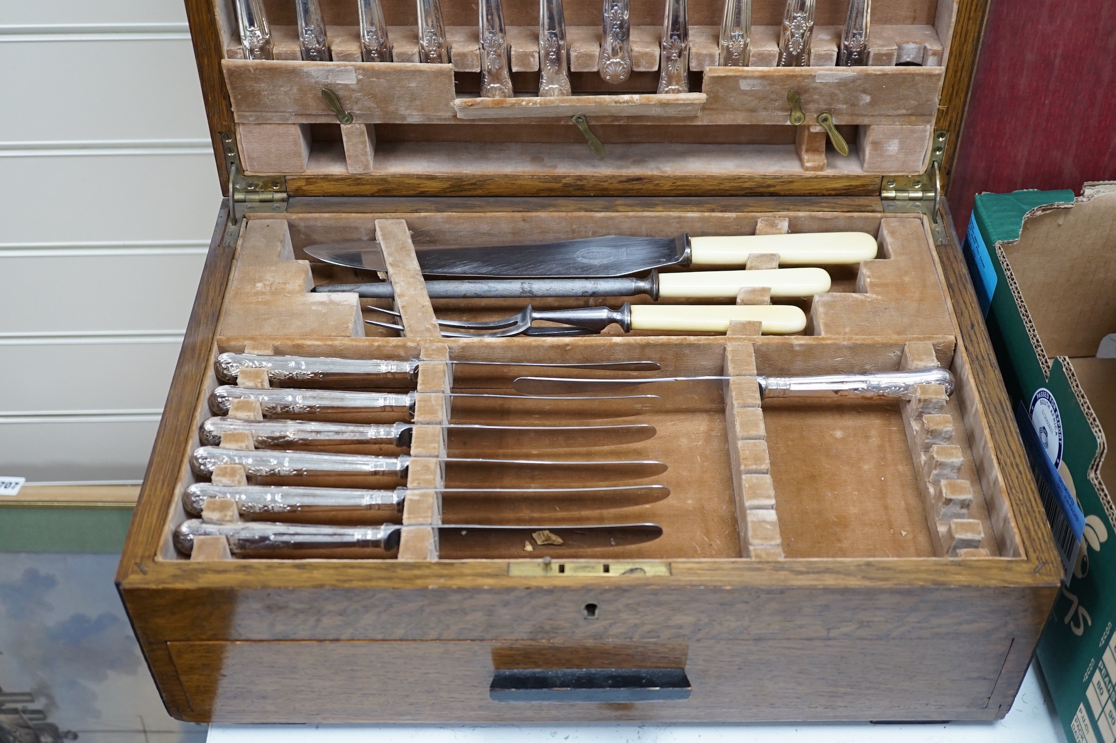 A mid 20th century canteen of Kings pattern plated flatware